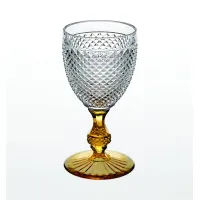 Picture A goblet made of glass with a timeless shape with an amber-colored handle - Vista Alegre