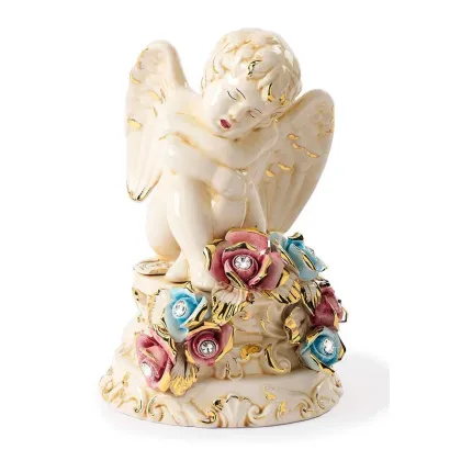Picture Beautiful decorative angel figurine on a base