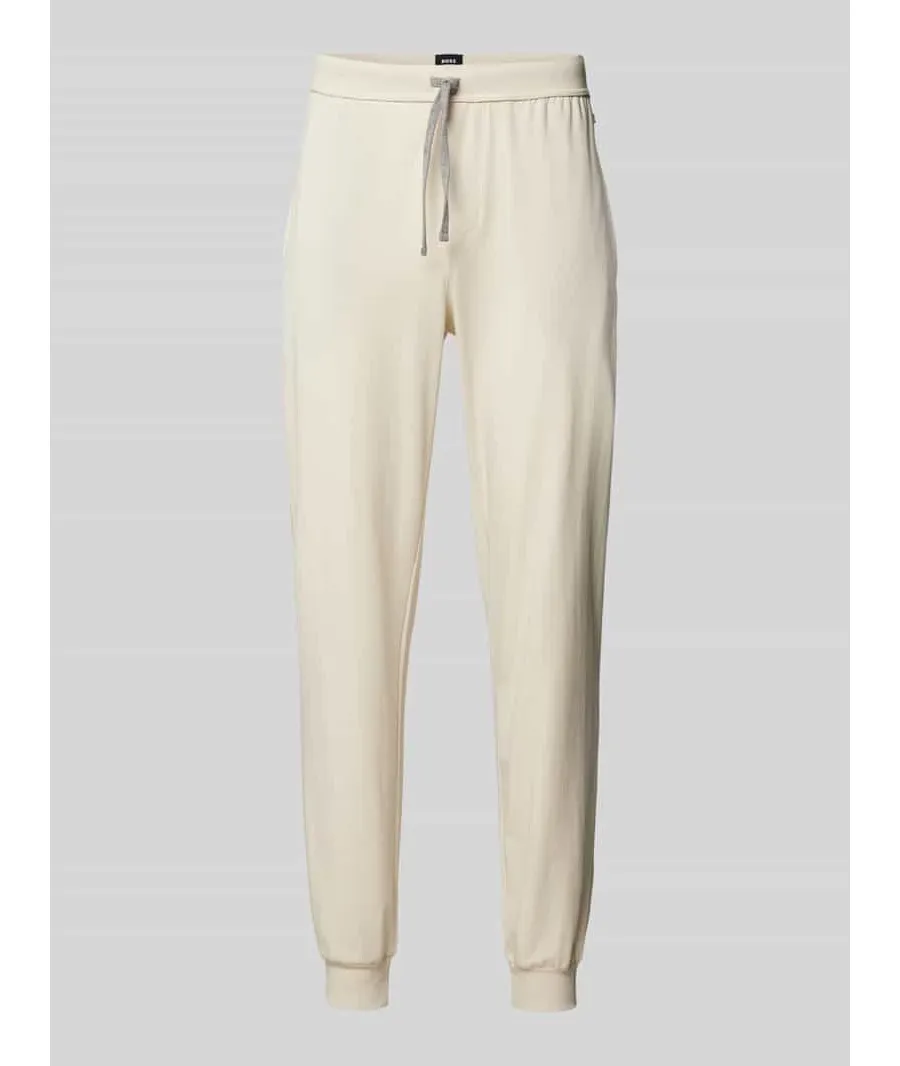 obrazek 1 Spodnie dresowe o kroju relaxed fit z wyhaftowanym logo model ‘Mix&Match’