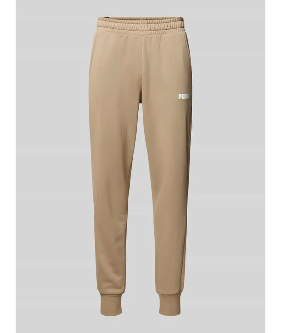 obrazek 1 Spodnie dresowe o kroju regular fit z nadrukiem z logo