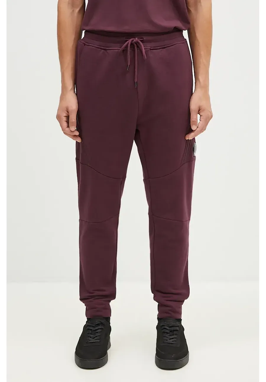 obrazek 1 C.P. Company spodnie dresowe bawełniane Diagonal Raised Fleece Lens Sweatpants kolor fioletowy gładkie 17CMSP084A005086W