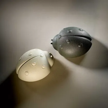 Picture A unique ladybug figurine in many colors from the Italian brand