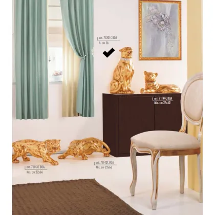 Picture Sitting panther with a beautifully decorated collar - Valle d'oro Patchi