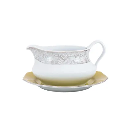 Zdjęcie Wyjątkowa porcelanowa sosjerka ze spodkiem do jadalni