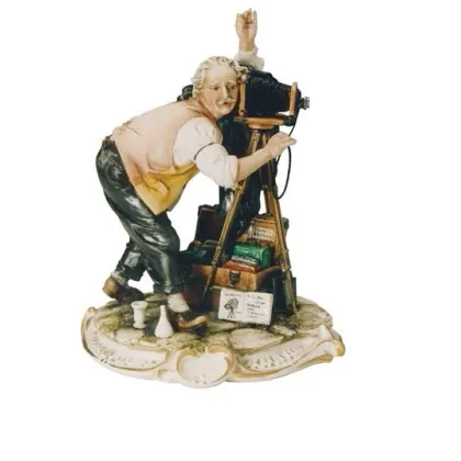 Zdjęcie Porcelanowa figurka fotografa