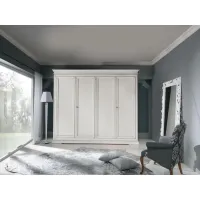 Picture Italian 4-door wardrobe with 2 shelves, 3 clothes rails and inner chest of drawers with 3 drawers - Zanini