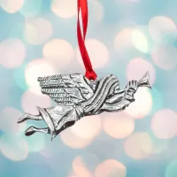 Picture Beautiful small Christmas decoration in the shape of an angel made of tin