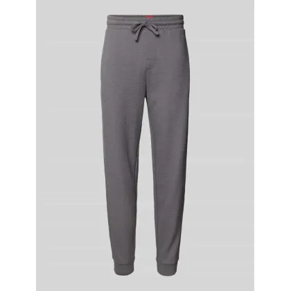 Zdjęcie Spodnie dresowe o kroju relaxed fit z fakturowanym wzorem model ‘Austin’
