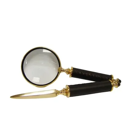 Zdjęcie Szkło powiększające i nóż do listów z czarną rączką