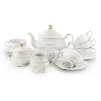 Picture Stylish 15-piece porcelain tea set decorated with a delicate gold rim in a modern style – Leander