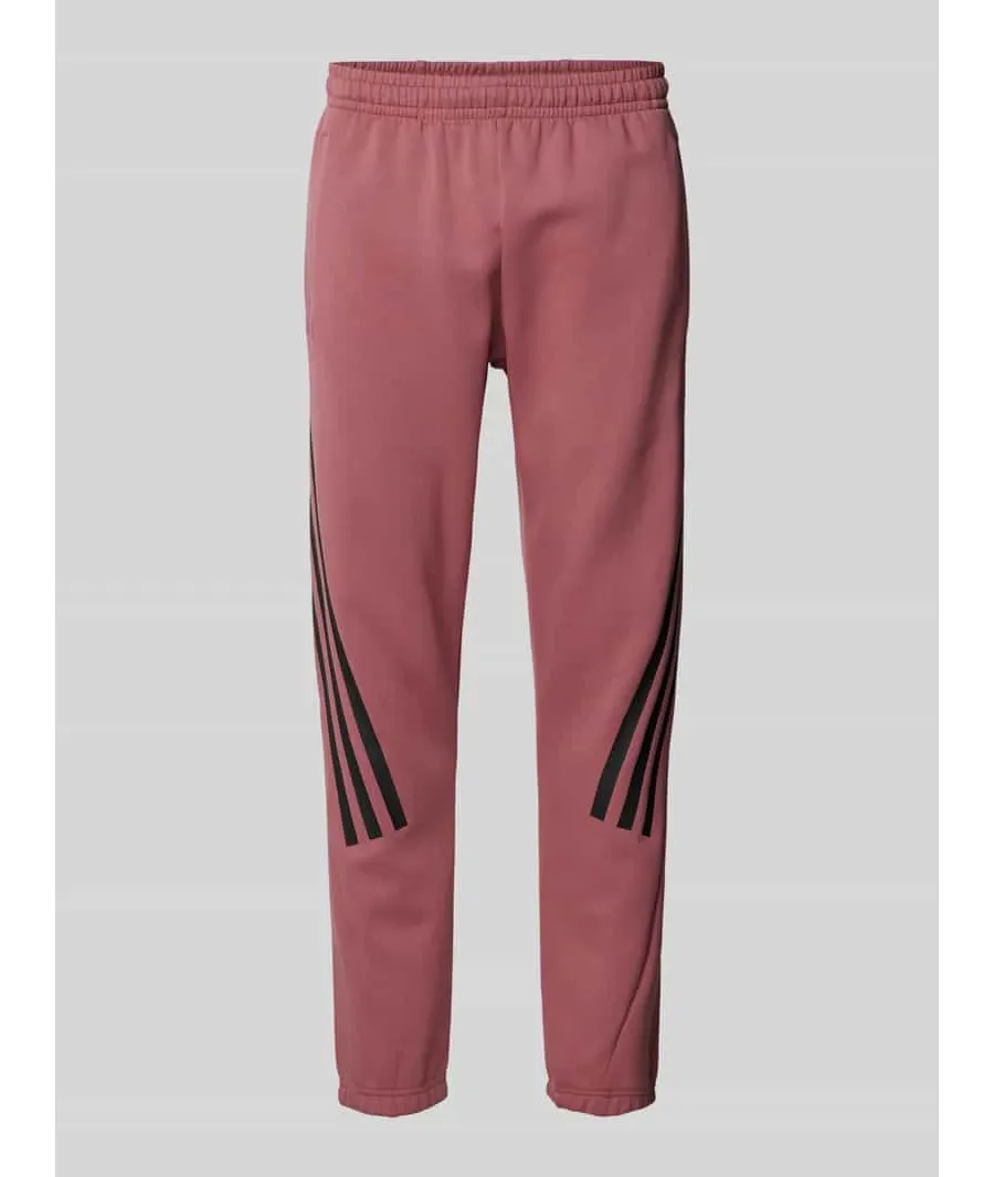obrazek 1 Spodnie dresowe o kroju slim fit z charakterystycznymi dla marki paskami