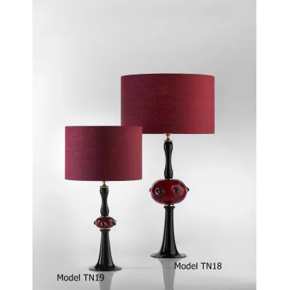 Picture Luxurious lamp on a chest of drawers