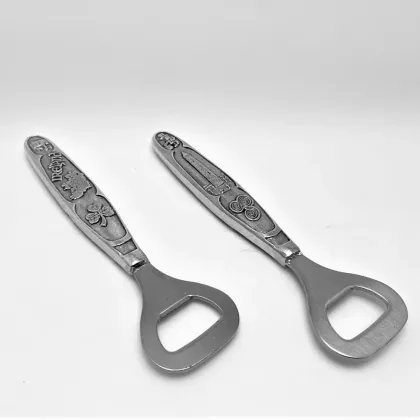 Picture Unique pewter bottle openers decorated with Irish motifs