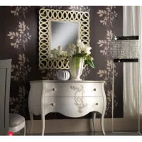 Picture A tasteful chest of drawers with relief decoration for the living room