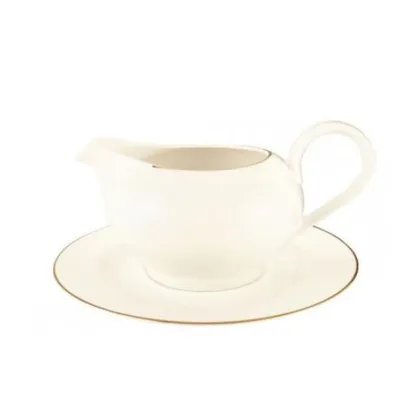 Zdjęcie Kremowa porcelanowa sosjerka ze złotą obwódką w stylu klasycznym – Tettau