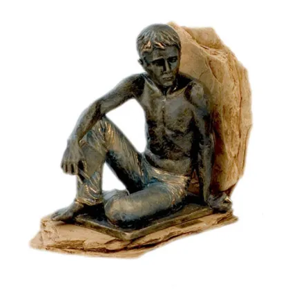 Zdjęcie Wyjątkowa podpórka do książek - chłopiec z księgą