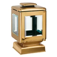 Picture An elegant bronze candle with a square grave base