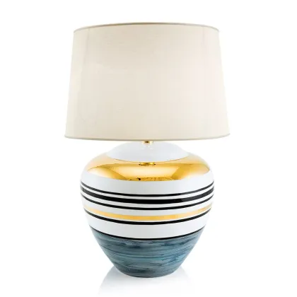 Picture Ceramic round table lamp with gold accents – Ahura