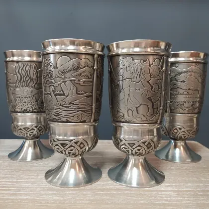 Picture A unique set of Irish pewter cups with a depiction of legends