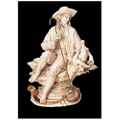 Zdjęcie Porcelanowa figurka mężczyzny z gęsiami