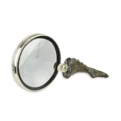 Picture A magnifying glass with a handle in a beautiful, thick frame