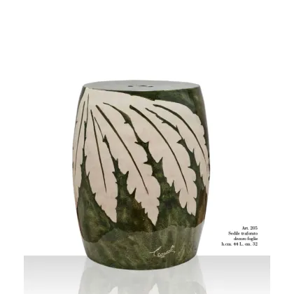 Zdjęcie Ceramiczna podstawa z perforacją z kremowymi liśćmi na zielonym tle