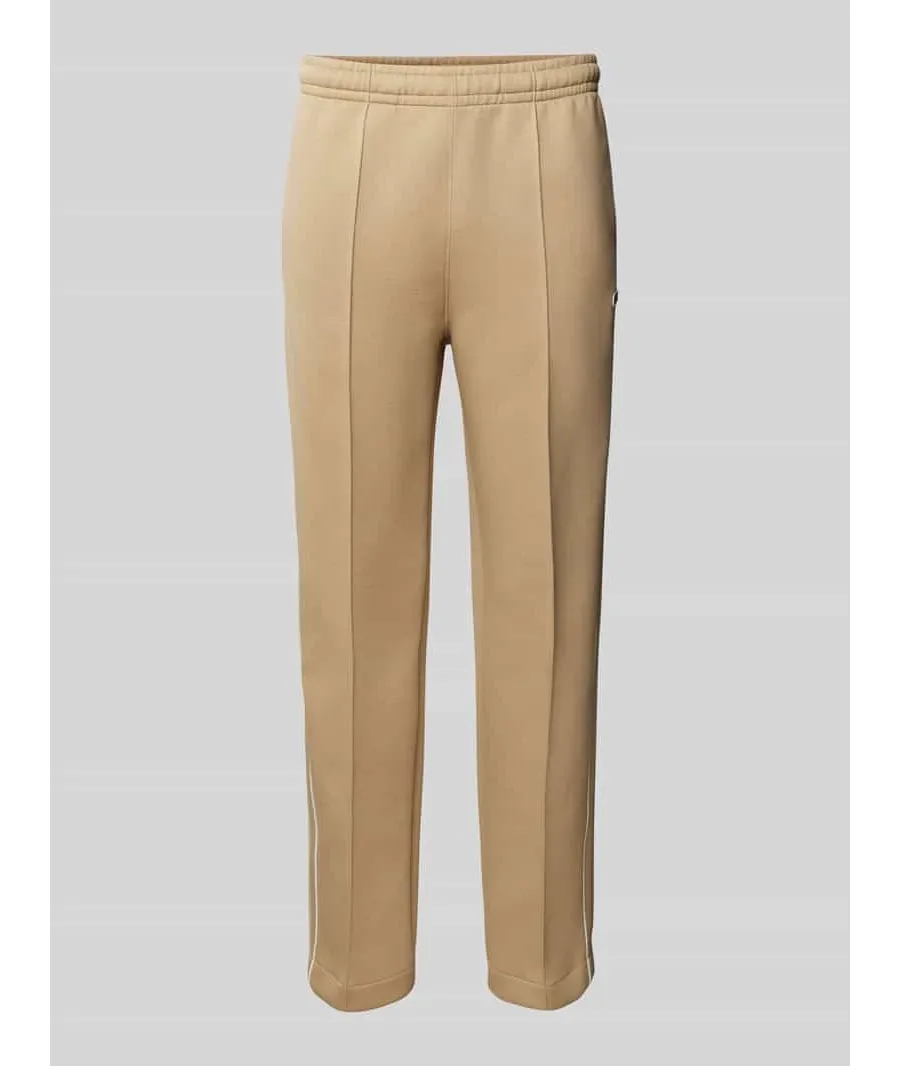 obrazek 1 Spodnie dresowe o kroju slim fit z naszywką z logo