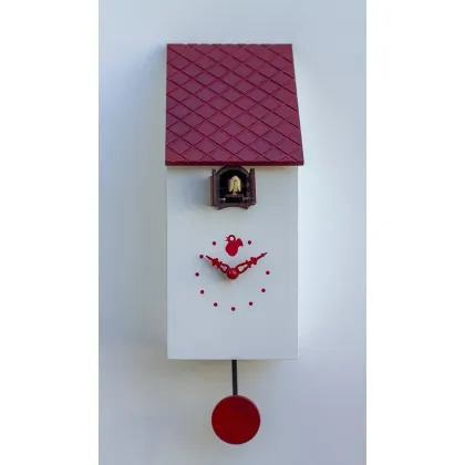 Picture An unusual clock resembling a cuckoo house