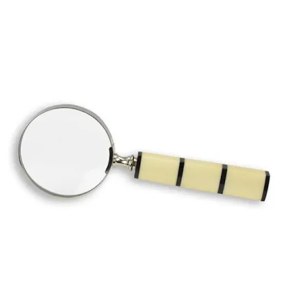 Picture A magnifying glass with a cream handle in a round frame