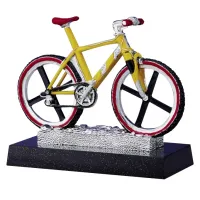 Picture A unique figurine with a bicycle