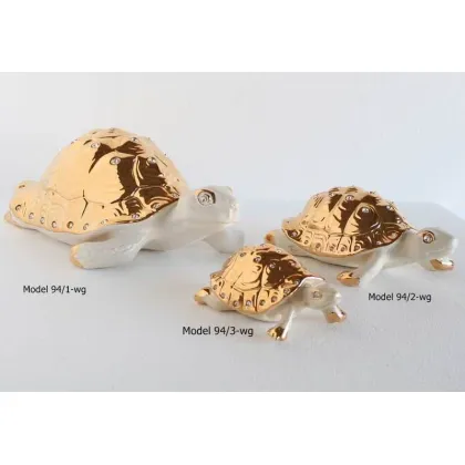 Picture A charming family of turtles made of ceramics