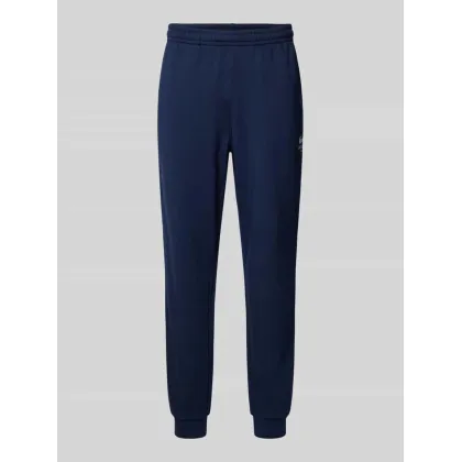Zdjęcie Spodnie dresowe o kroju tapered fit z nadrukiem z logo model ‘HERITAGE’