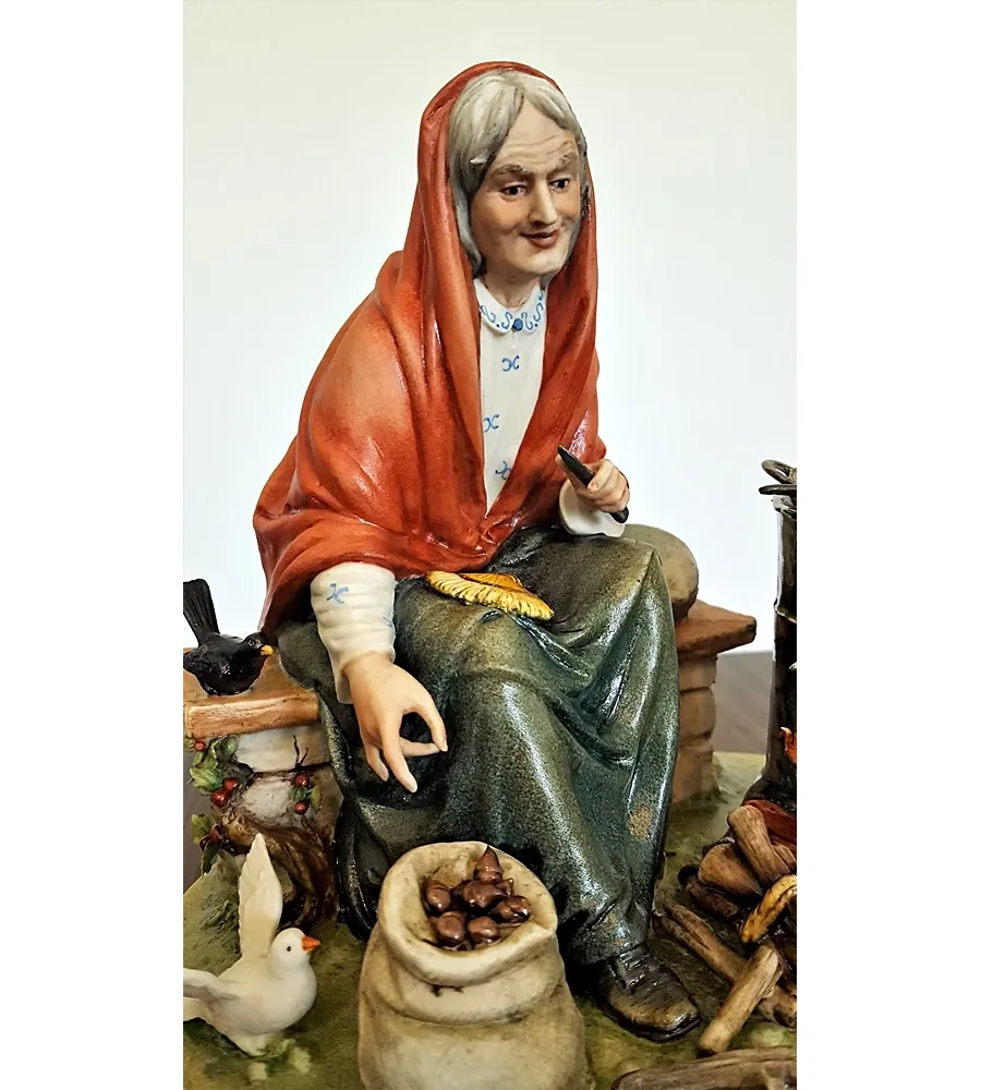 obrazek 4 Porcelanowa figurka kobiety piekącej kasztany
