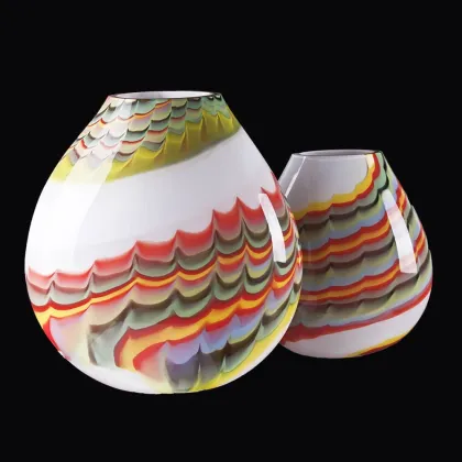 Picture A cheerful, bulbous lamp made of Murano glass