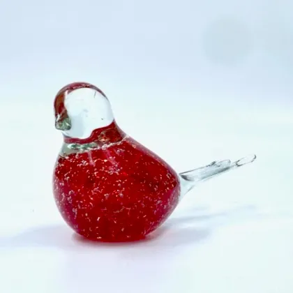 Picture A charming figurine of a red glass bird - a great gift for someone special