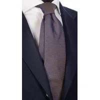 Picture A show tie with an iridescent effect and tiny blue lines